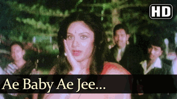 Aaj Babua Bhaye Kotwal Lyrics - Anupam Kher | Mohan Choti | Shakti Kapoor | Mohammed Aziz | S. Janaki (Sishta Sreeramamurthy Janaki)