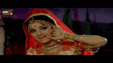 Bansuri Tohari Nandlal Lyrics - Manoj Kumar | Asha Parekh | Shatrughan Sinha | Asha Bhosle