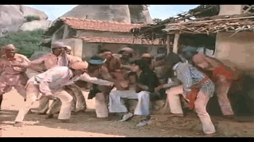 Chalo Saheli - Holi Ke Din Dil Khil Jaate Hain Lyrics - Amitabh Bachchan | Dharmendra | Helen | Lata Mangeshkar | Kishore Kumar