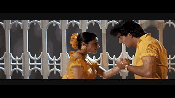 Dekha Teri Mast Nigahon Mein Lyrics - Akshay Kumar | Kunika | Shakti Kapoor | Udit Narayan | Sapna Mukherjee