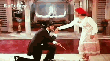 Do Chaahne Walo Ki Mulakat Lyrics - Pran | Deven Verma | Sanjeev Kumar | Lata Mangeshkar | Mohammed Rafi