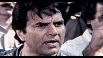 Es Afsar Ka Baja Lyrics - Dharmendra | Shammi Kapoor | Prem Chopra | Kavita Krishnamurthy | Shabbir Kumar