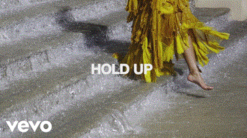 Hold Up Lyrics