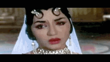 Kali Kali Ankho Me Lyrics - Feroz Khan | Mukri | Naaz | Asha Bhosle