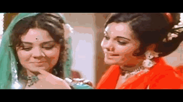 Koi Sehri Babu Lyrics - Mumtaz | Dharmendra | Raaj Kumar | Asha Bhosle
