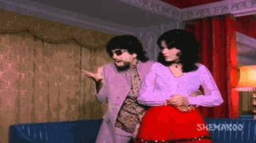 Main Kachhe Angoor Ki Bel Lyrics - Pran | Ashok Kumar | Shashi Kapoor | Amit Kumar | Kanchan