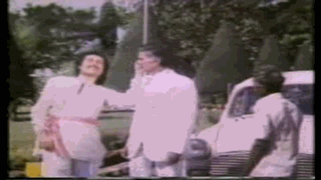 Neeche Zameen Upar Gagan Lyrics - Suresh Oberoi | Sarika | Rakesh Roshan | Amit Kumar | K. J. Yesudas (Kattassery Joseph Yesudas)
