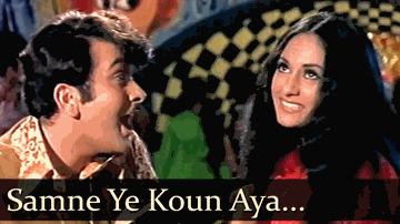 Samne Yeh Kaun Aaya Lyrics - Randhir Kapoor | Nirupa Roy | Balraj Sahni | Kishore Kumar