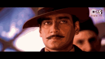 Soora Sau Pehchaniye Jo Lade Deen Ke Hait Lyrics - Sushant Singh | Ajay Devgan | Amrita Rao | Sukhwinder Singh | Karthik