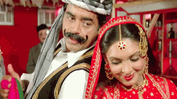 Surkh Jodaa Pehen Kar Lyrics - Jagdeep | Shatrughan Sinha | Parveen Babi | Kishore Kumar
