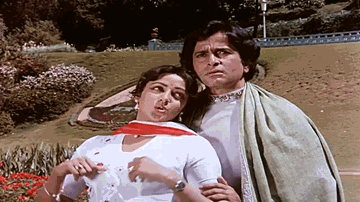 Yeh Zulfon Ki Bikhri Ghata Lyrics - Amitabh Bachchan | Hema Malini | Shashi Kapoor | Asha Bhosle