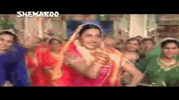 Zara Dholki Bajao Goriyo Lyrics - Ayub Khan | Milind Gunaji | Shashi Kapoor | Asha Bhosle | Udit Narayan